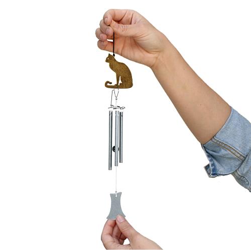 Jacob's Musical Chimes hand tuned wind chime sitting cat held in hand for size