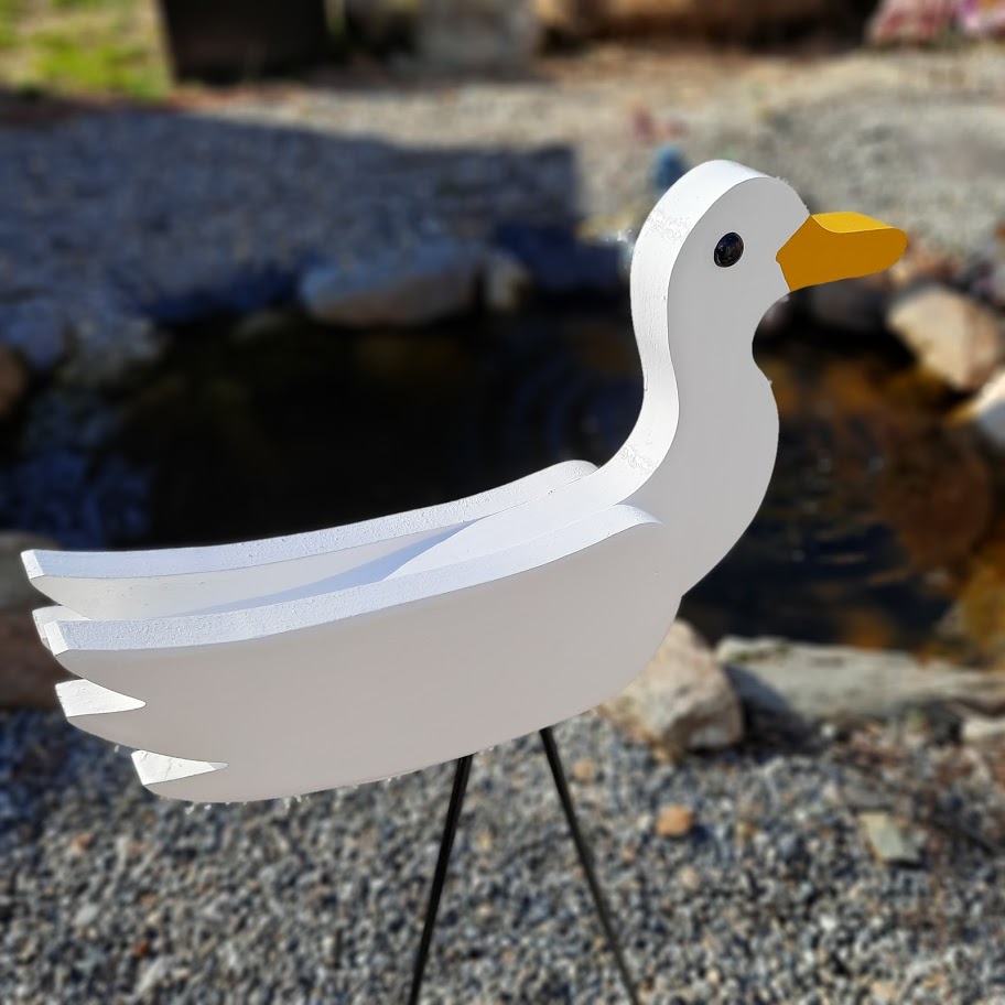 White momma duck made by the Amish out of wood and hand painted.