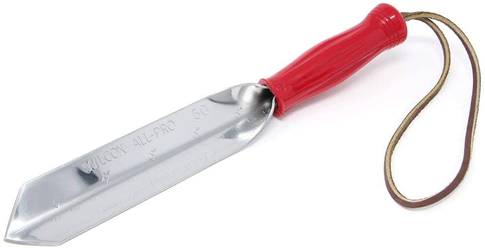 Wilcox 9 inch stainless steel trowel with red plastic handle with leather wrist loop